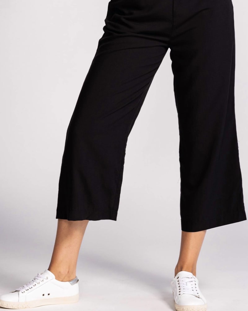 Front of a model wearing a size L Margo Pant in Black in Black by PINK MARTINI. | dia_product_style_image_id:345346